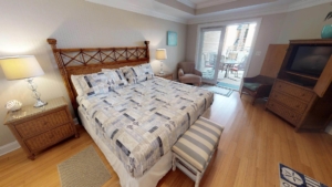 After a night out at Tybee Island Bars, relax in a comfortable bedroom at your vacation rental.