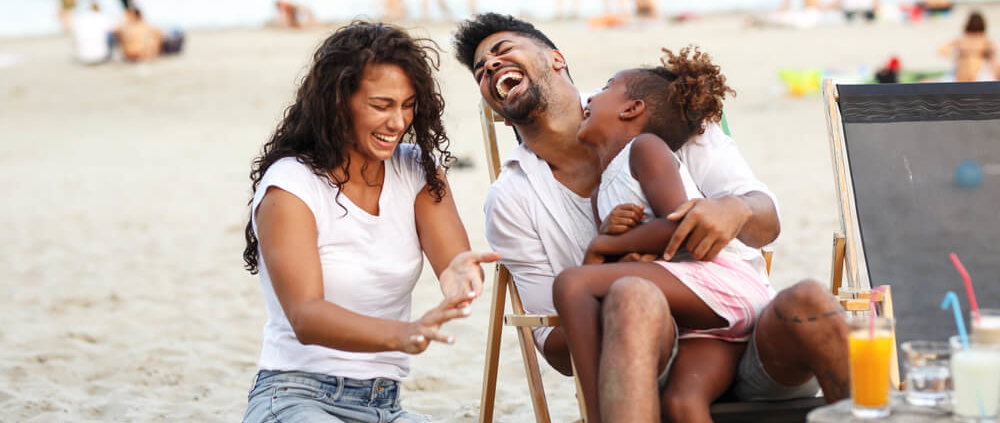 A family spending time on one of the best beaches in Tybee Island, Georgia, for families.