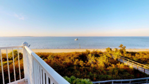 The view of Tybee Island beach from a balcony where you can watch the changing tides.