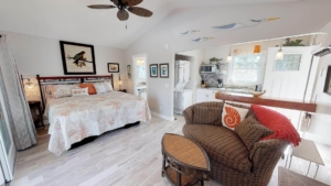 The bedroom of a Tybee Island rental to stay at while enjoying events.