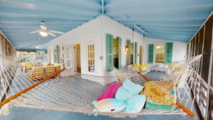 The hammock and porch of a Tybee Island rental near some of the best places to eat.