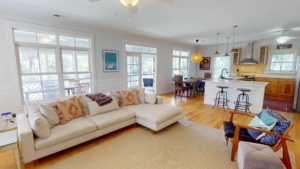 The living room of a Tybee Island rental close to local holiday events in Georgia.